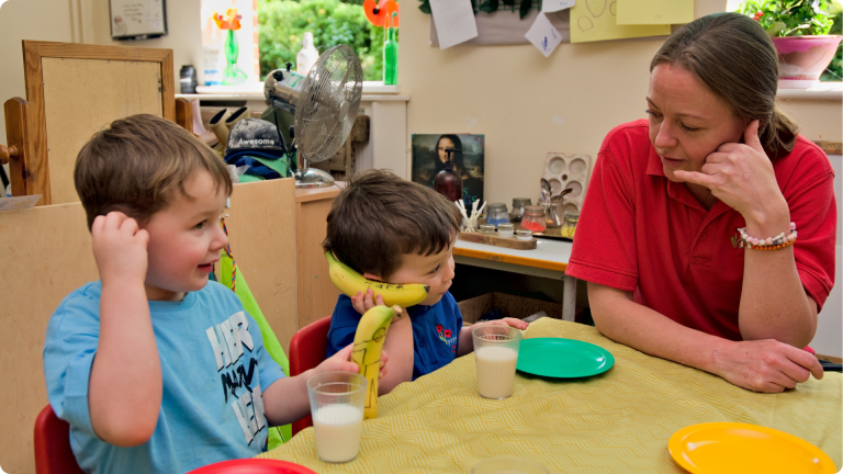 Children and Poppies Nursery practitioners using bananas as phones: How to Manage Daycare Communication