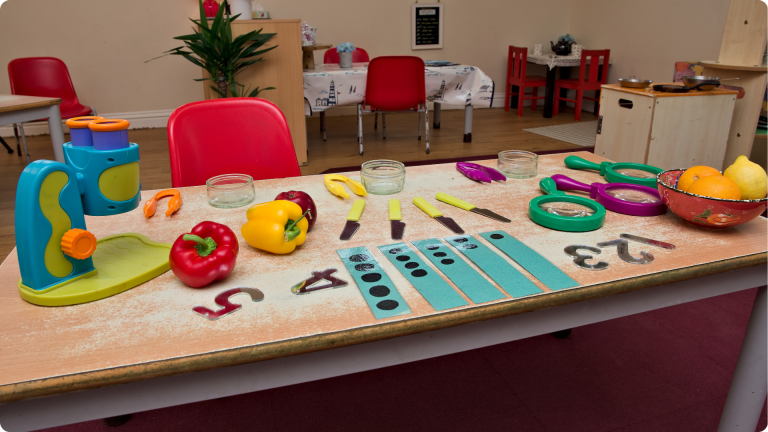 Environmental Factors That Affect Child Development: shown by an activity set up in a nursery room